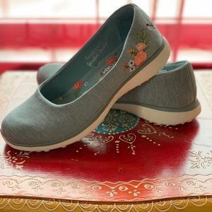 New pair of comfortable gray slip on shoes